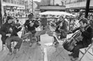 View: s27538 Lindsay String Quartet playing on The Moor Bandstand