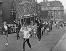 View: s27957 Attercliffe Whit Sing Parade including Attercliffe Baptist Sunday School walking along Shirland Lane with Midland Bank at the junction of Attercliffe Road and Baker Street in the background