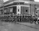 View: s28692 Czechoslovakian Central Army Band in Barkers Pool with the Gaumont Cinema in the background