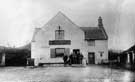 Group of men outside Red Lion public house, Grenoside, 