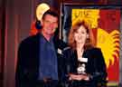 View: a01948 Guest of honour, Michael Palin and overall winner, J. K. Rowling at the Sheffield Children's Book Award at the Crucible Theatre, 1998