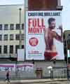 View: a02098 Advertising banner for the play 'The Full Monty' on the side of the Central Library building, Arundel Gate