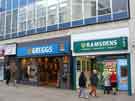 View: a03518 Shops on The Moor showing (r. to l.) Ramsdens, pawnbrokers (No.63) and Greggs bakery (No.61)