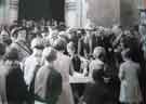 View: a03719 Sheffield Pilgrimage.  Elsie Lawrence left and Lady Mayoress, Mrs W J Hunter, distributing sets of Sheffield cutlery to the children of Bapaume, France