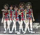 View: a03892 Mural of Def Leppard on roller shutter of shop, The Moor