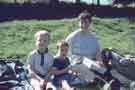 View: a04595 Pamela Teasdale, wife of Bob Teasdale, with her sons Robert and Richard.