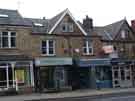 View: a04813 Timber Windows of Sheffield, No. 918 and Barking Mad, pet supplies and grooming, No. 916 Ecclesall Road