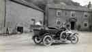 View: arc02568 Wightman family members in motorcars outside what appears to be the Ladybower Inn, Derbyshire