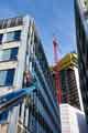 Looking between One St. Pauls Place and Two St. Pauls Place towards City Lofts Apartments under construction in the background 