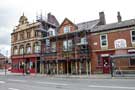 View: c04554 Deli at the Don (No. 754-756), Don Valley Hotel (behind scaffolding) and Zeenat Indian Cuisine, Attercliffe Road