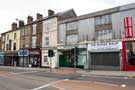 View: c04611 The Snake Shop (No. 678), Minute Man Press Sheffield Printing (No. 680), Lab 13 Tattoo Parlour (No. 684), MSM Travel Services (No 686) and Indus Indian Restaurant (No. 688-690), Attercliffe Road