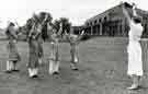 View: h00108 Young patients exercising under supervision of Mrs P. Clabby, MCSP, Superintendent Physiotherapist, City General Hospital / Fir Vale Infirmary (latterly Northern General Hospital), Fir Vale