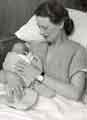 View: h00139 Mother and baby on Maternity ward, City General Hospital (latterly Northern General Hospital), Fir Vale, c. 1950s