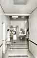 View: h00186 Maternity Ward showing (centre) Sister Wood and doctors, City General Hospital / Fir Vale Infirmary (latterly Northern General Hospital), Fir Vale c.1960s