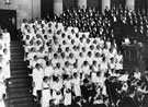 Unidentified Choir performing at the City Hall showing one of the City Hall Lions (right)