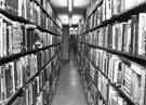 View: s31836 David Bromley, Reference Librarian, in the Basement Stack, Central Library, Surrey Street