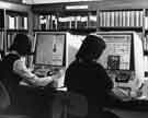 View: s31873 Microfilm readers in use in the Arts and Social Sciences Reference Library, Central Library, Surrey Street