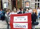 View: s31934 Library workers with Unison banner outside the City Hall, Barkers Pool during the Libraries strike of 1995