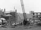 Demolition of Walker and Hall Ltd, Electro Works, Eyre Street; with Sheffield College of Technology in rear centre