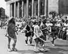 View: s32349 Stone Age men as portrayed by the Ecclesfield Eagles FC at the Sheffield Pageant, outside the City Hall