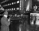 View: s32797 Police use of a 'walkie talkie' radio outside Pauldens Ltd., (latterly Debenhams), department store,The Moor