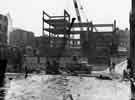 View: s33450 Construction of John Walsh Ltd, department store (latterly Rackhams, House of Fraser and T.J.Hughes), junction of High Street and Arundel Gate with Park Hill flats in the background