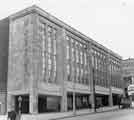 View: s33451 John Walsh Ltd, department store (latterly Rackhams, House of Fraser and T.J.Hughes), junction of High Street and Arundel Gate with Park Hill flats in the background