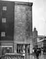 View: s33453 John Walsh Ltd, department store (latterly Rackhams, House of Fraser and T.J.Hughes), junction of High Street and Arundel Gate with Park Hill flats in the background