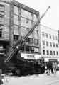 View: s34360 Exhibition of old fire appliances on Fargate showing Ravel and Dolcis shoe shops in background