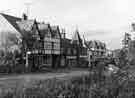 View: s34968 Shops on Baslow Road, Totley showing L.Tym, butcher and Totley Fruit store