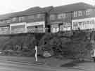 View: s34975 Shops on Baslow Road, Totley, showing No. 86 A. Griffiths, fishmonger, No. 88 H.J. Purdy, decorator, No. 90 S.B. Evans, fruiterer, No. 92 National Provincial Bank and No. 94 Jack Whalley, electrical engineers