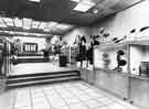 View: s35905 Interior of Brightside and Carbrook Cooperative Society, Castle House (No.1) department store, Angel Street showing view up to main doors from the bottom of the end aisle