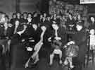 View: s35907 Interior of Brightside and Carbrook Cooperative Society, Castle House (No.1) department store, Angel Street showing ladies searching for a shoe bargain