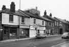 View: s36429 Shops on Ecclesall Road showing (left to right) No.117 the Snack and Sandwich Bar; No.119 Peter Smith Racing Ltd, betting shop; No.121 Waterall Brothers (Sheffield) Ltd, beef and pork butchers; No.125 Star Carpets, carpet dealers 