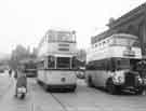 View: s36984 Bus and trams Nos,185 and 518 at the Corn Exchange looking towards Exchange Street  