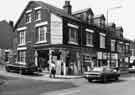 View: s38538 Nos.214-222 London Road at junction with Cecil Square showing (left to right) Castles, painters and decorators ( No.222); Imperial Cafe (Nos. 216-218) and V. Freeborough, shoes and shoe repairs (No.214)