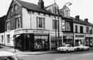 View: s38547 Nos.196-208 London Road at junction with Grosvenor Square showing (left to right) Bee Brothers (Sheffield),gents outfitters (No.208); unknown butchers (No.206) and V. I. Wrintmore and Co., estate agents (No.204); 