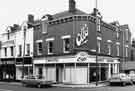 View: s38555 Nos.169-175 London Road at the junction with Randall Road showing (right to left) F. W. Otto Ltd, cabinet makers (Nos 173-175); Irene Wright Ltd, gown maker (No.171) and M. Newman (Tailors) Ltd (No.169)