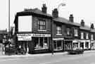 View: s38556 Nos.315-333 London Road at the junction with Holland Place showing (left to right) Gilbert Funnell and Son, second hand furniture dealers (Nos.315-317); M. Bower, hairdressers (No.319) and Cowen Barrett Ltd, plumbers merchants, (Nos.329-333)