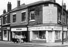 View: s38565 Nos.139-143 London Road at the corner of John Street showing (left to right) Eric Hadfield, gents hairdressers (No.139); Sheffield Hobbies Centre, model dealers (No.141) and Eric and Nellie Hadfield, ladies hairdressers (No.143)