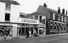 View: s38569 Nos.125-137 London Road showing (left to right) Wigfalls, furniture dealers (No.125) and The Old Crown public house(No.137)