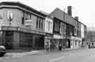 View: s38653 London Road, Sharrow showing (left to right) Prince of India, Asian restaurant; The Saint, hairdressers (No.288) and Highfield Motor Parts