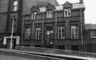 View: s38654 No.5 Meetinghouse Lane showing (left to right) I.Lewis and Co.Ltd, wholesale drapers (No.3) and Anthony Favell and Co. solicitors