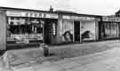 View: s38938 Shops on Mansfield Road, Intake showing (left to right) Stork newsagents; Hair Charm, hairdressers and solarium and Bendix Launderette