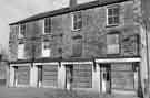 View: s39025 Derelict shops, Market Street, Woodhouse showing (left to right) Winifred Camden (No.3), ladies outfitter; Audrey's Flower Centre and D. J. Tomlinson Ltd, chemists