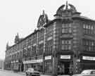 View: s39190 Shops in Cavendish Buildings, corner of West Street and Mappin Street showing (left to right) Leslie S.Jones and Co. Ltd, office furniture and appliances suppliers (Nos.212-218) and T. A. Brooks and Co. Ltd, shoe suppliers (No.210)