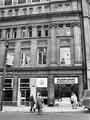 View: s39200 Beethoven House, Leopold Street showing Huddersfield Building Society (right) and Wilson Peck Ltd., music warehouse, (Nos. 66-70)