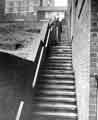 View: s39388 Steps leading up to Woodside Flats and Pye Bank Road showing the Fox and Duck public house at the top. Pye Bank Flats as viewed from Pitsmoor Road