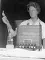 View: s40430 Dispensing of small tracer doses of radio-active materials behind a protective lead screen c.1962