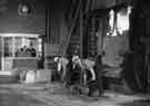 View: s40731 Samuel Fox and Company, Stocksbridge Works showing a 19 foot hearth diameter electric arc furnace, with the control room in the background